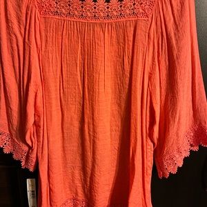 New Direction, Ladies size medium, orange top.